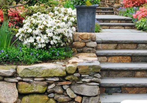 Enhance Your Garden’s Aesthetic with Sandstone Pavers and Walls